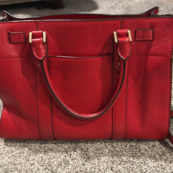 Large Michael Kors handbag with gold accents. - Picture 5 of 6